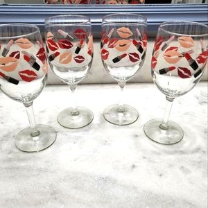 Four kiss mark/ lipstick wine glasses. New, never used.